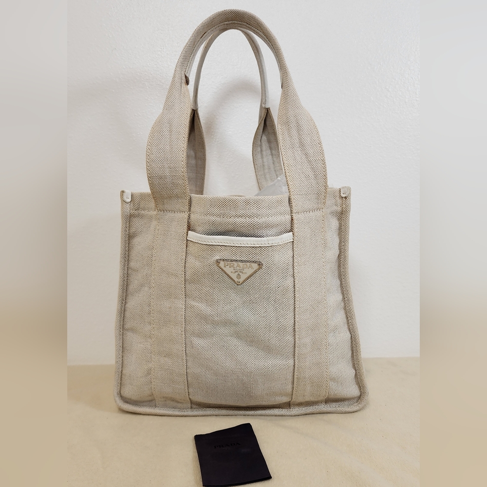 Prada Canvas Canapa Shoulder Tote. Stain in exterior pocket from paperwork.